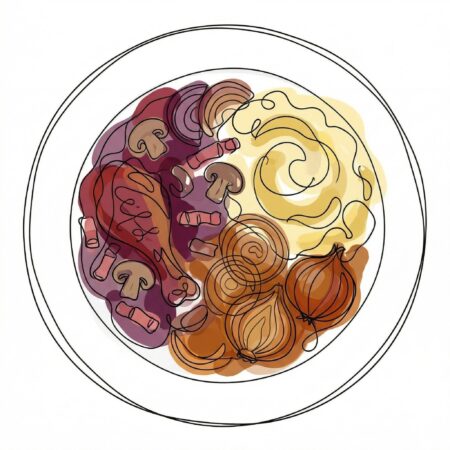 Coq au Vin mit Kartoffelpüree und geschmorten Zwiebeln.